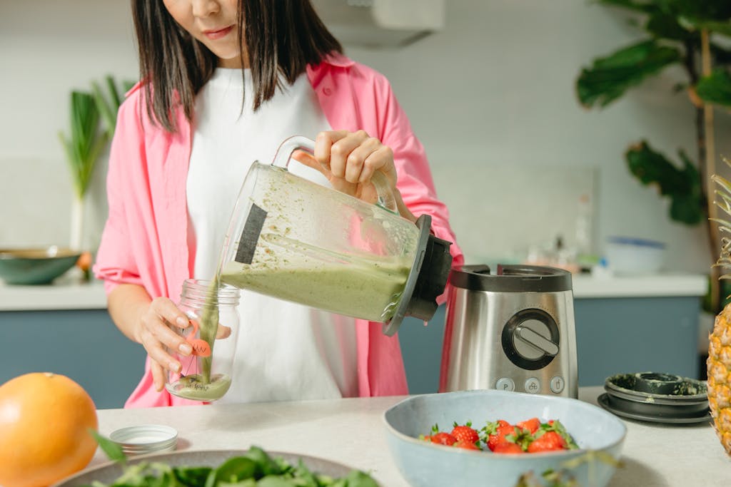 Woman Makes Green Smoothie